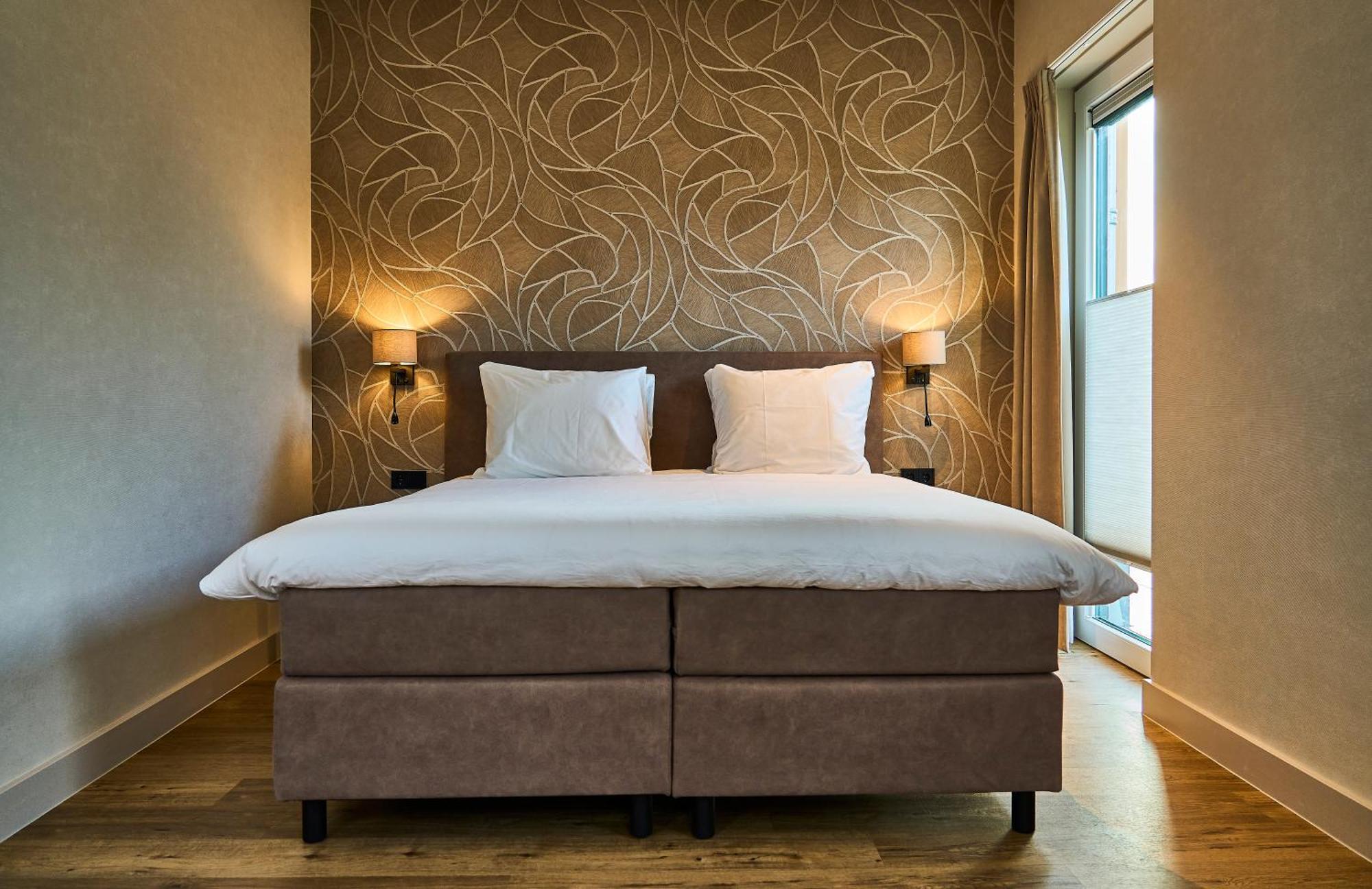 Eilandhotel Texel De Cocksdorp  Exterior photo A boxspring bed